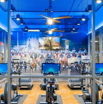 Fitness center featuring peloton cycle® studio, life fitness machines, treadmills & ellipticals